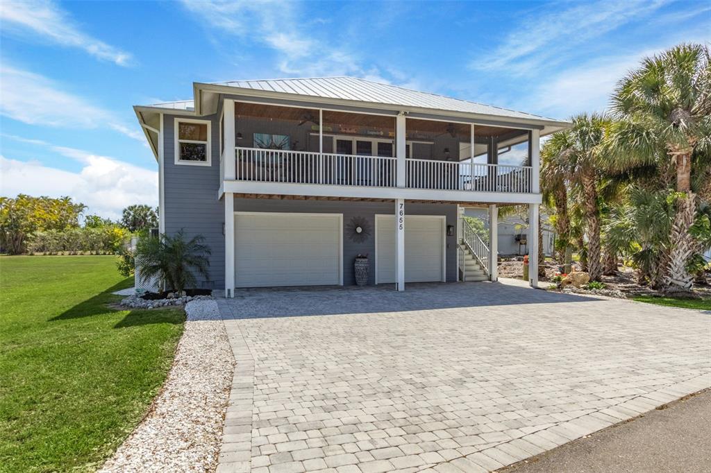 7655 MYRSINE CIRCLE, BOKEELIA, FL — photo 3 of 30