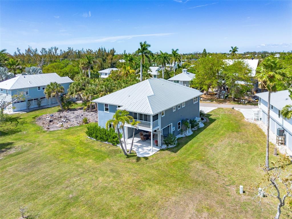 7655 MYRSINE CIRCLE, BOKEELIA, FL — photo 5 of 30