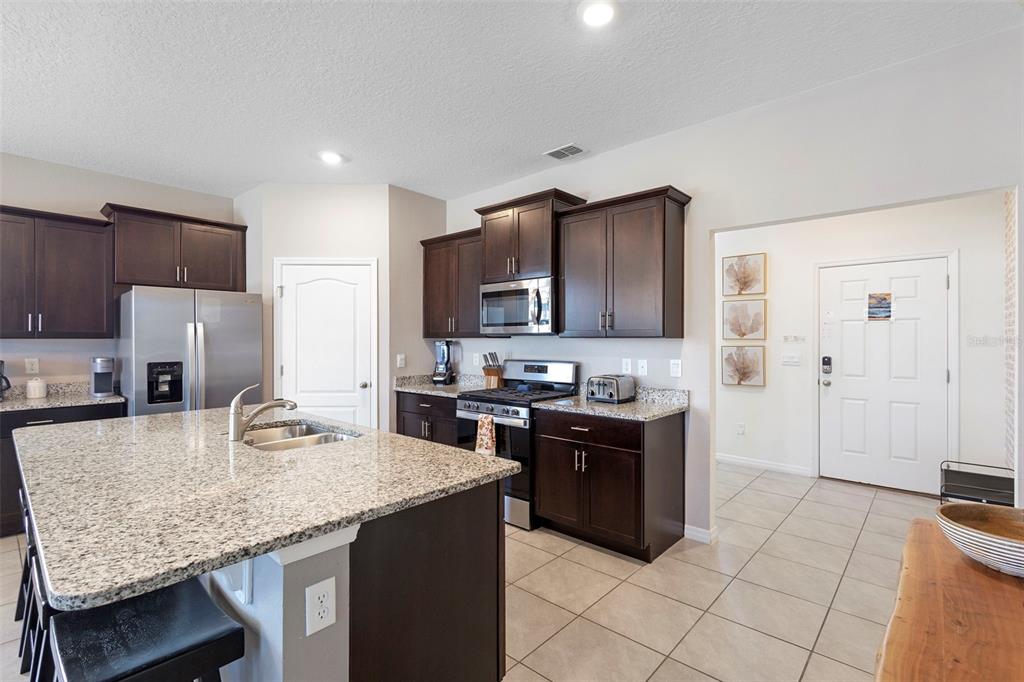 7592 OAKMOSS LOOP, DAVENPORT, FL — photo 4 of 30