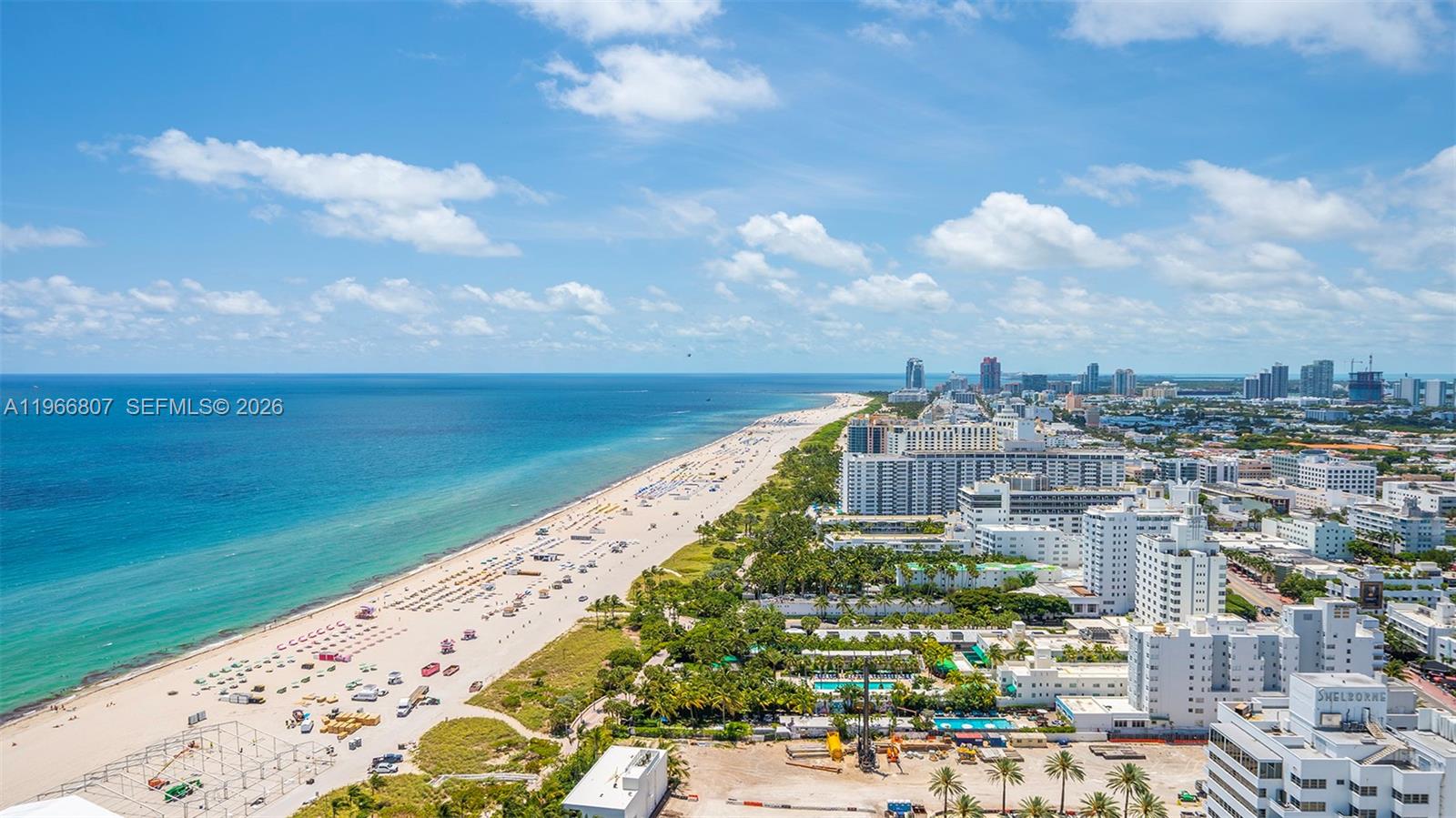 An aerial view shows a sandy beach along the ocean next to a coastal city — 101 20th St # 3909, Miami Beach FL 33139, MIAMI BEACH, FL