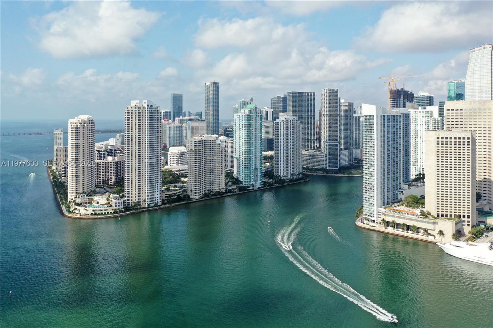 An aerial view of the Miami skyline featuring high-rise buildings along the waterfront — 1700 NW North River Dr, Miami FL 33125, MIAMI, FL