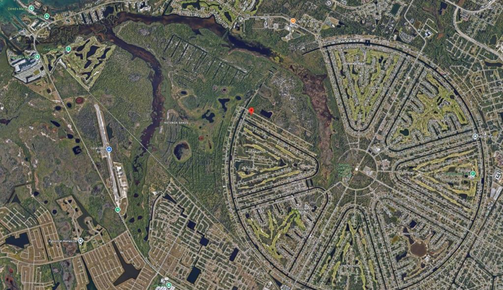 This aerial map shows the circular residential layout of Rotonda West, Florida, with surrounding wetlands — 285 ROTONDA BOULEVARD S, ROTONDA WEST, FL
