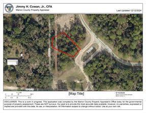 This is a map showing an aerial view of a wooded property lot outlined in red — 28th Street, Hollywood FL 33020, HOLLYWOOD, FL