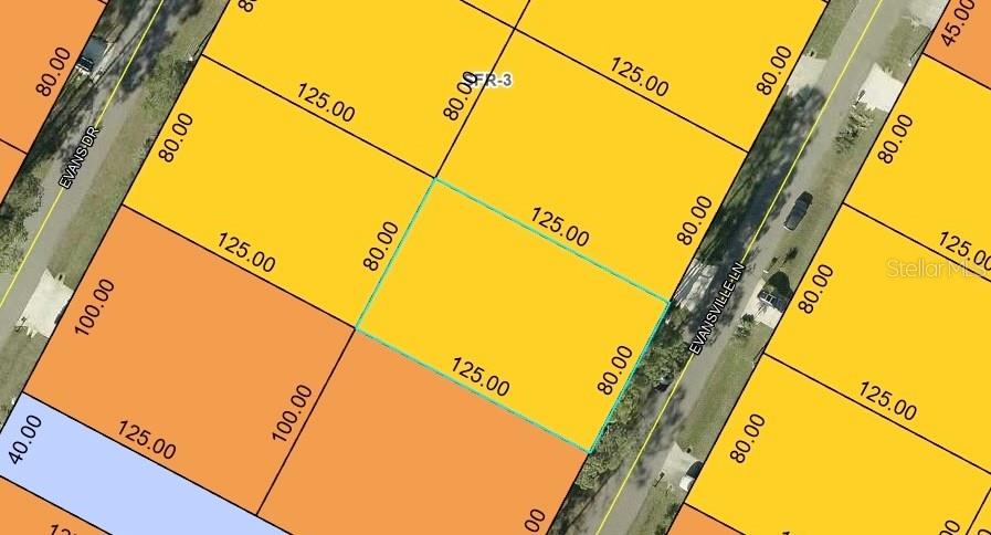 This is a map showing a rectangular parcel of land highlighted in yellow — 28 EVANSVILLE LANE, PALM COAST, FL