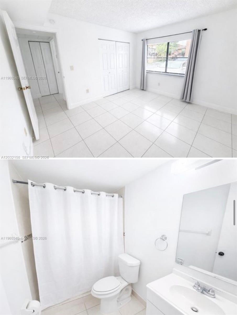 This image shows a bedroom with white tile floors and a bathroom with a shower — 2530 W 67th Pl # 29, Hialeah FL 33016, HIALEAH, FL