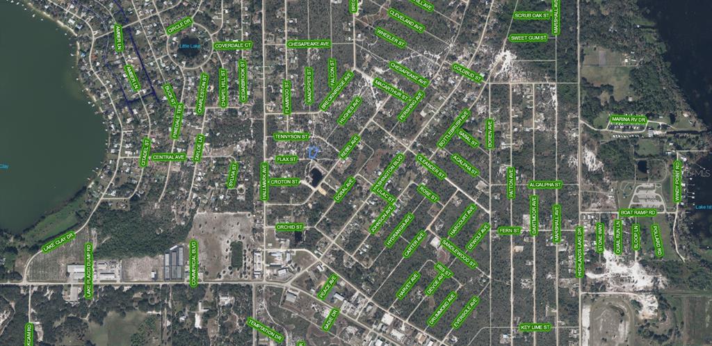This is an aerial map showing residential streets and a lake in a suburban area — 1018 FLAX STREET, LAKE PLACID, FL