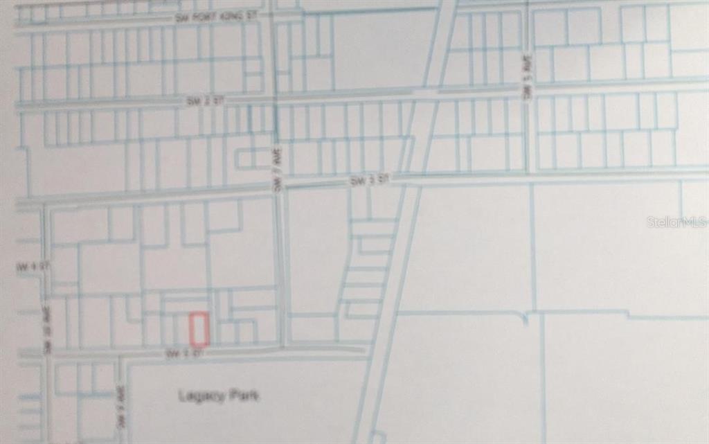 This is a map showing a residential lot highlighted in red near Legacy Park — 727 SW 5TH STREET, OCALA, FL