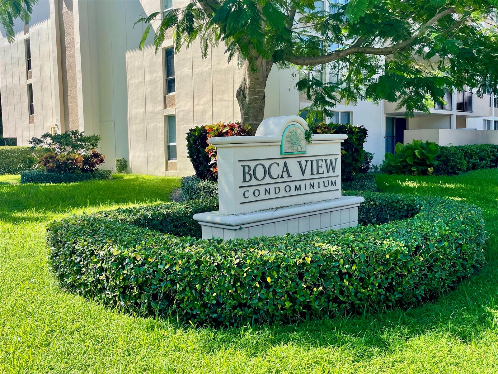 A sign for Boca View Condominium stands in a landscaped lawn in front of a building — 1000 Spanish River Road # 2n, Boca Raton FL 33432, BOCA RATON, FL