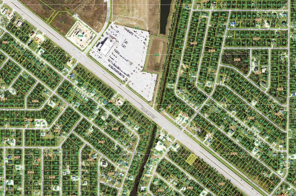 This is an aerial map showing residential lots and streets in a suburban neighborhood — 355 TAMIAMI TRAIL, PORT CHARLOTTE, FL