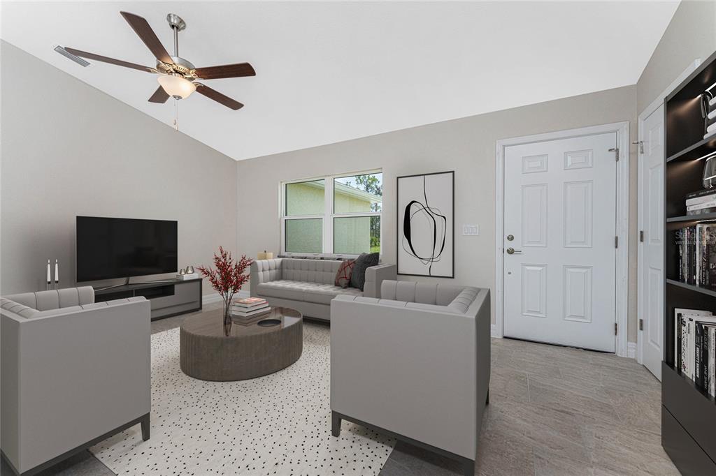 This is a virtual rendering of a living room featuring gray furniture and tile flooring — 1425 LINDSAY AVENUE, NORTH PORT, FL