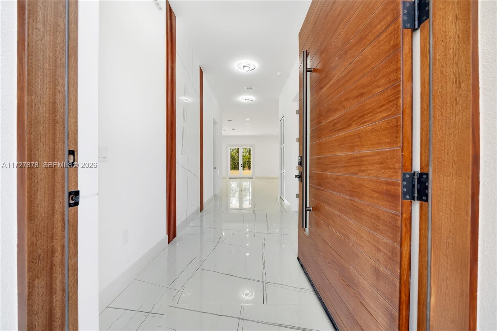 FRONT 4'X8' MAHOGANY DOOR AND FOYER — OCALA, FL