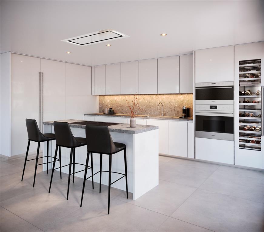 This rendering shows a modern kitchen with white cabinets, a stone island, and bar stools — The Icon 1120 ASHFORD AVE UNIT 1202, SAN JUAN, PR