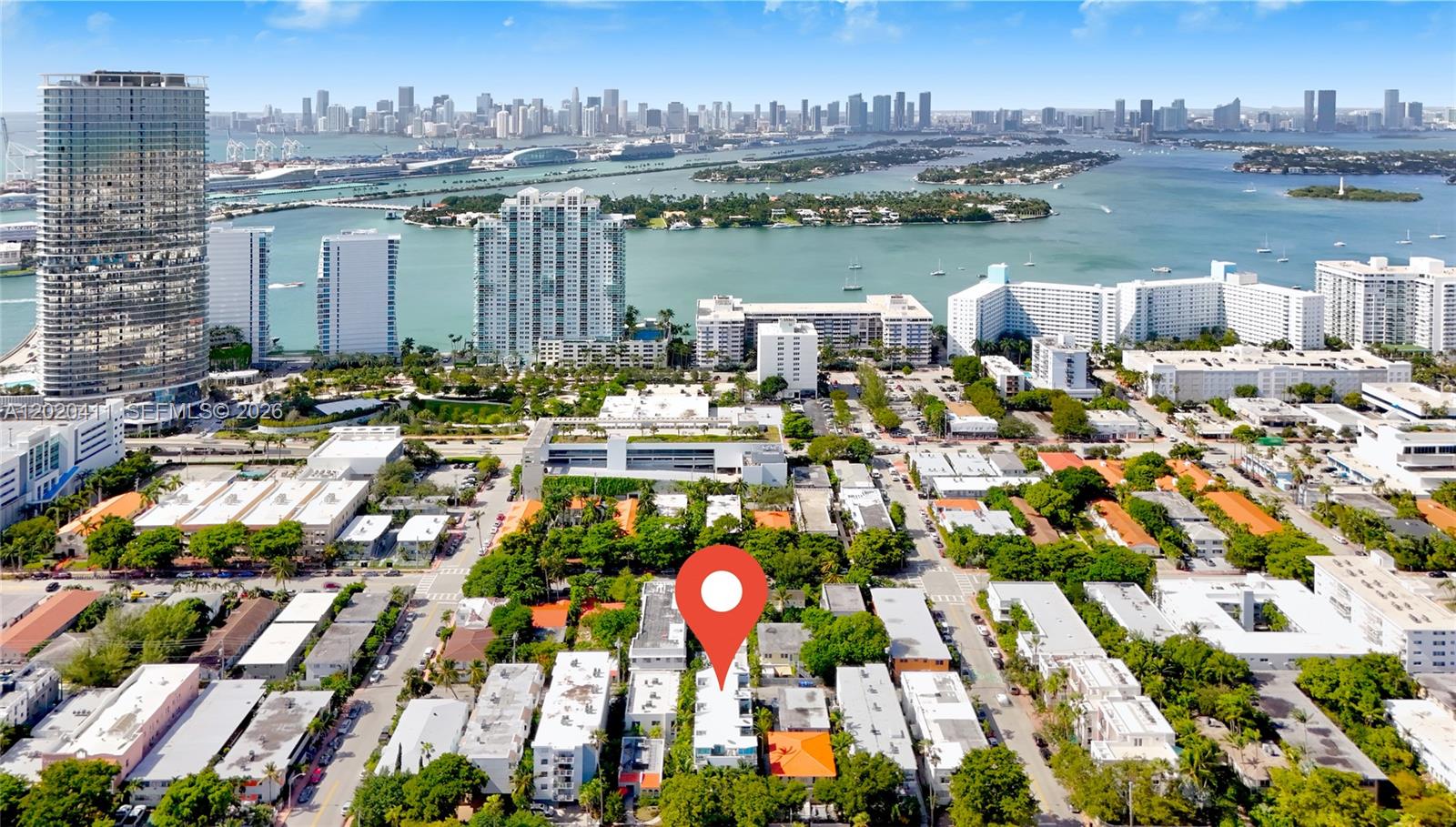 An aerial view shows a multi-story building marked with a red pin in a city — 734 Michigan Ave # 6, Miami Beach FL 33139, MIAMI BEACH, FL