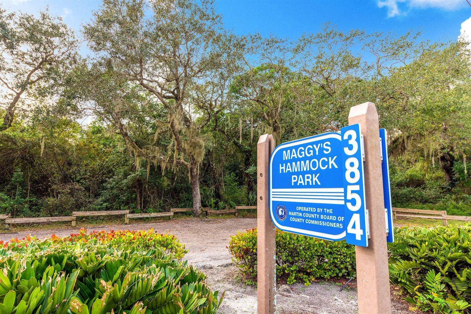 A sign for Maggy's Hammock Park stands in front of a wooded area — 4796 SE Manatee Terrace, Stuart FL 34997, STUART, FL