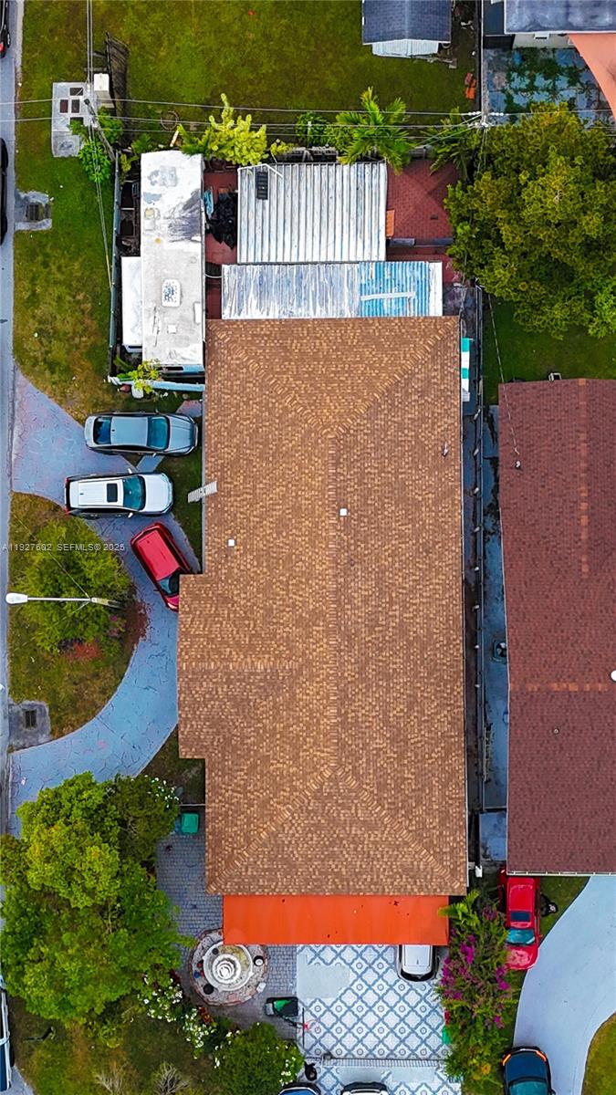 An aerial view shows a house with a brown shingled roof and surrounding vehicles — 598 SW 121st Ave, Miami FL 33184, MIAMI, FL