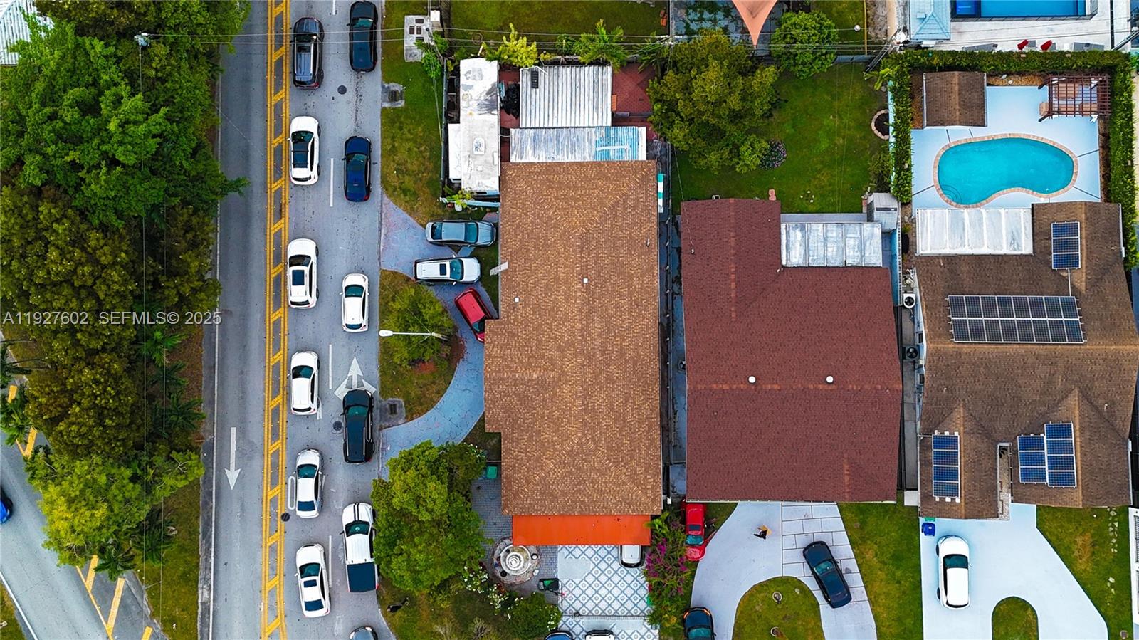 An aerial view shows two adjacent houses with pools and driveways next to a road — 598 SW 121st Ave, Miami FL 33184, MIAMI, FL