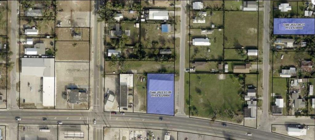 This is an aerial map showing property boundaries and highlighted real estate listings — 509 N JAMES AVENUE, PANAMA CITY, FL