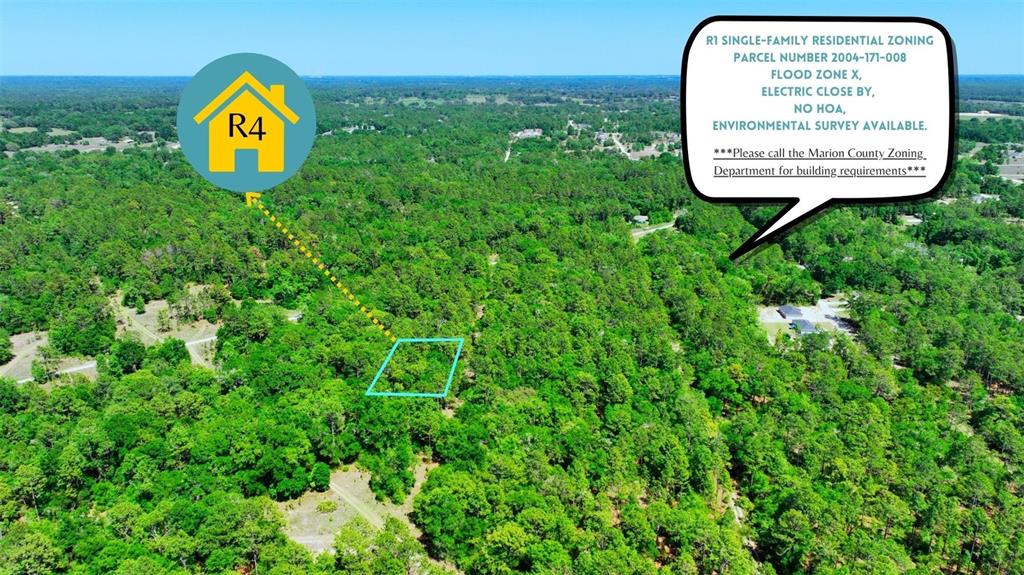 An aerial view shows a wooded plot of land marked with a blue boundary outline — TBD SW 24TH PLACE, OCALA, FL
