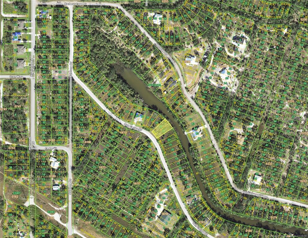 This is a satellite map showing residential lots, roads, and a canal — 27120 SAN CARLOS DRIVE, PUNTA GORDA, FL