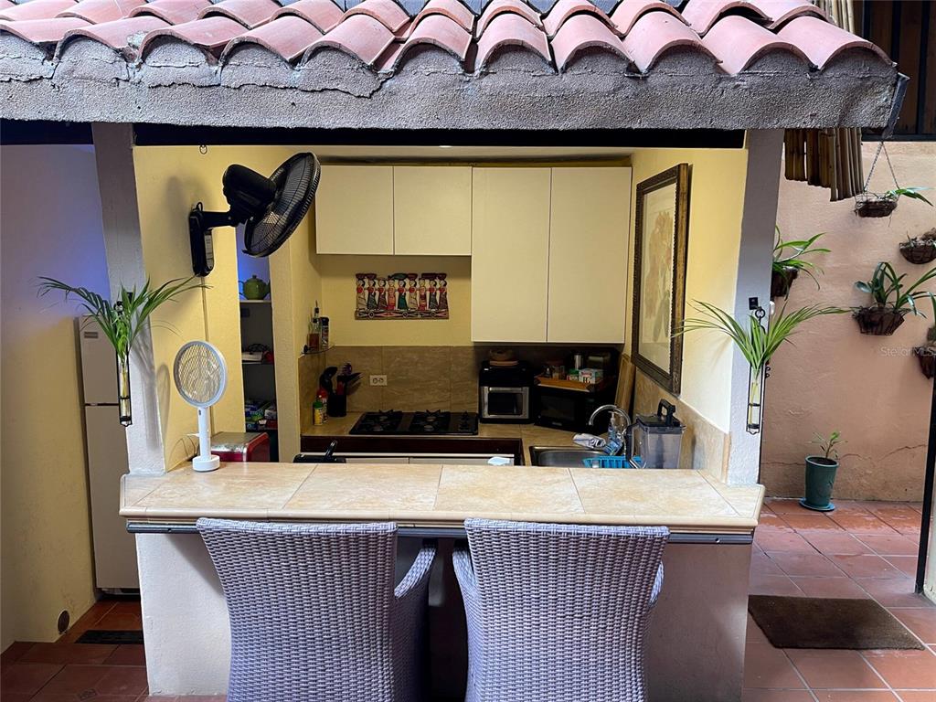 This floor plan shows the layout of a first floor with an in-law suite — 456 CALLE SALDAÑA, SAN JUAN, PR