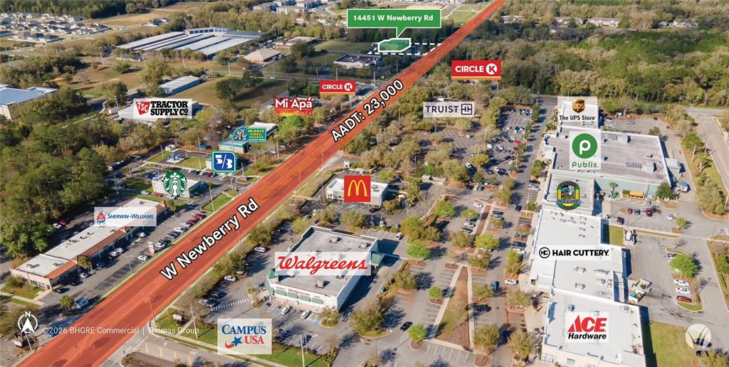 This aerial map shows commercial businesses and retail stores along a major road — 14451 W NEWBERRY ROAD, NEWBERRY, FL