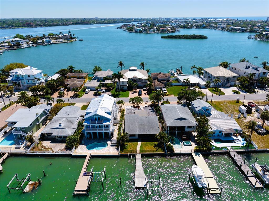 An aerial view of waterfront houses with private docks along a canal — 468 20TH AVENUE, INDIAN ROCKS BEACH, FL