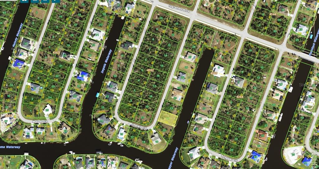This is an aerial map view of a residential neighborhood with canal-front lots — 9398 IMPALA CIR, PORT CHARLOTTE, FL