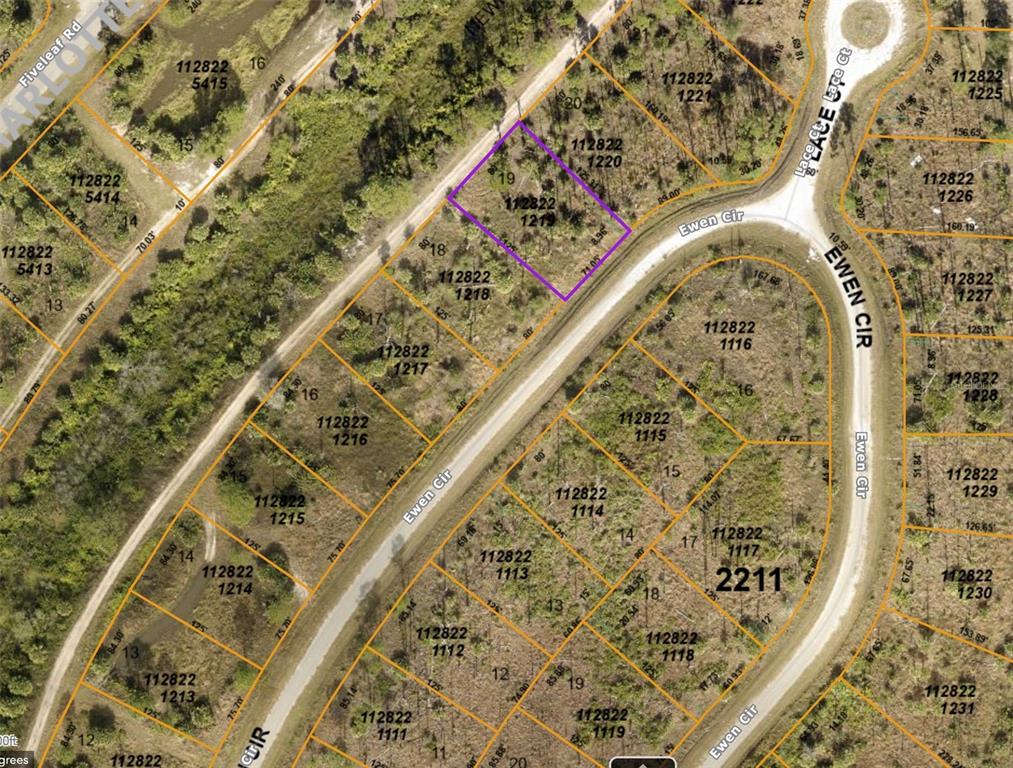 This is an aerial map showing residential land parcels and road layouts — Lot 19 EWEN CIRCLE, NORTH PORT, FL