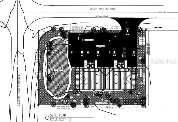 This is a site plan showing a building footprint, parking lot, and landscaping on a corner lot — 2679 LANDOVER BOULEVARD, SPRING HILL, FL