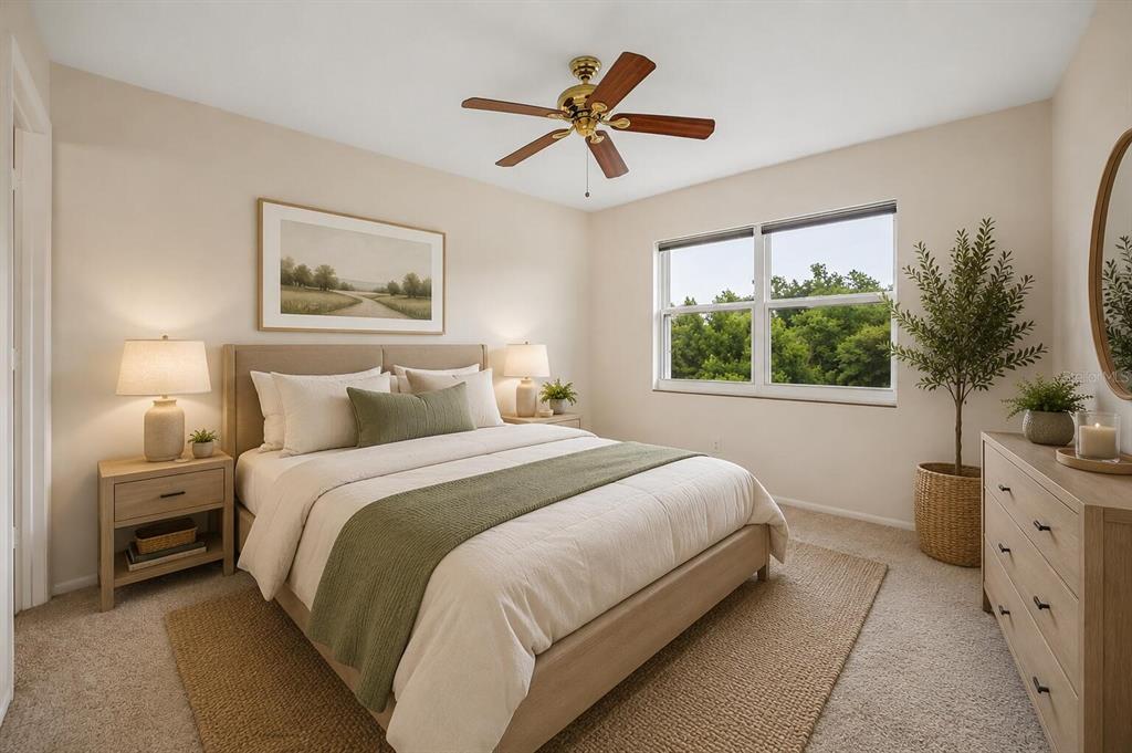 A bedroom features a queen bed, two nightstands, a dresser, and a ceiling fan — 26485 RAMPART BOULEVARD UNIT A27, PUNTA GORDA, FL