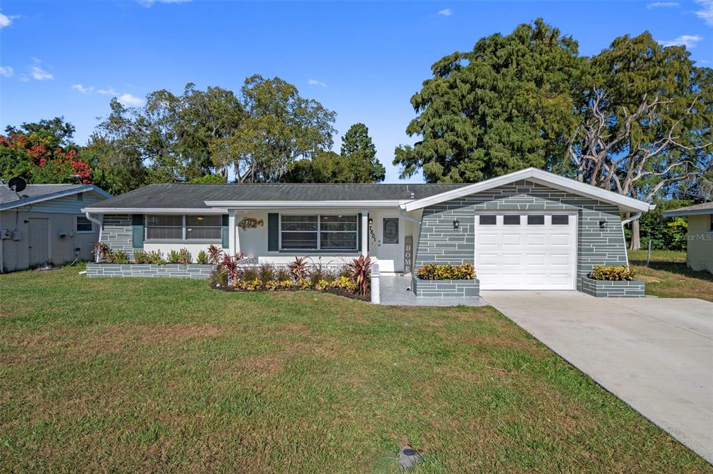 7801 RAINTREE DRIVE