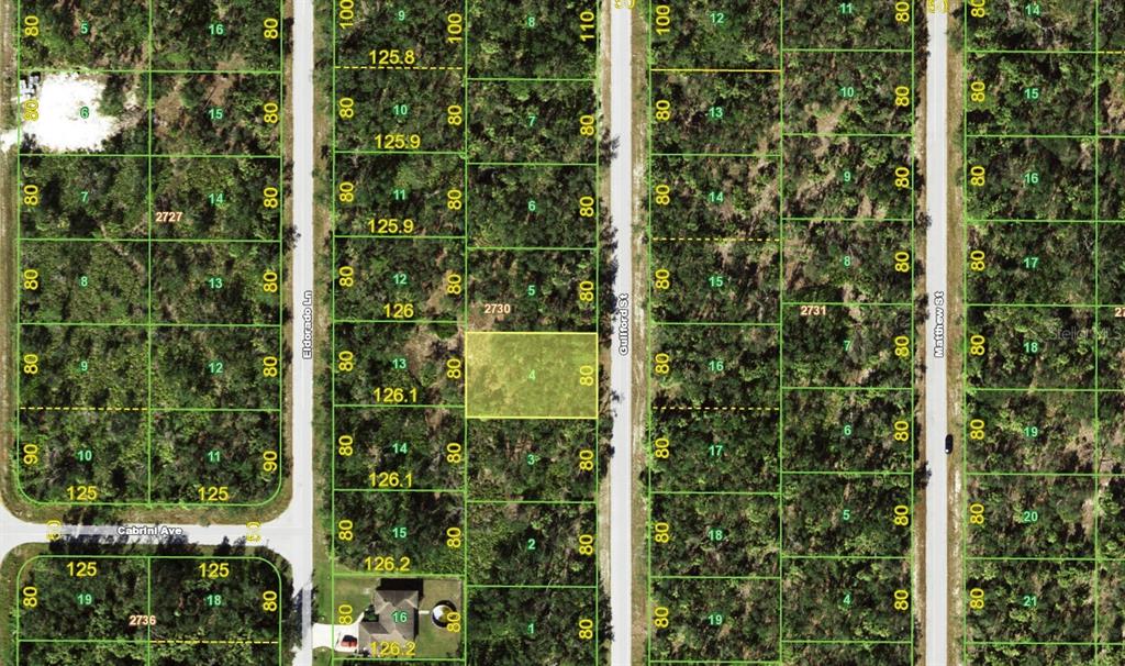 This is a property map showing residential lots and street layouts in a wooded area — 3105 GUILFORD STREET, PORT CHARLOTTE, FL