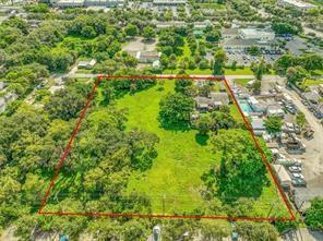 An aerial view shows a large, rectangular grassy lot outlined in red with surrounding trees — 1865 Donnell Road, West Palm Beach FL 33409, WEST PALM BEACH, FL