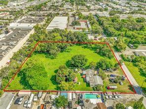 An aerial view shows a large, grassy, tree-filled lot outlined in red — 1865 Donnell Road, West Palm Beach FL 33409, WEST PALM BEACH, FL