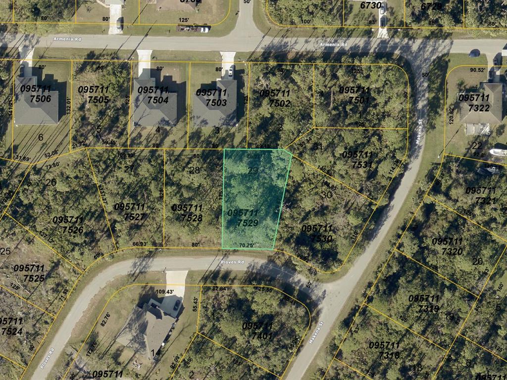 This is a satellite map showing a highlighted vacant lot in a residential neighborhood — 0 PLOVES ROAD, NORTH PORT, FL