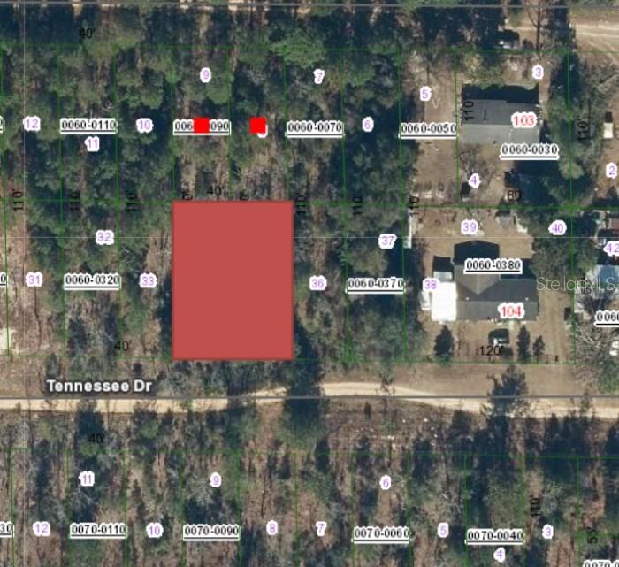 This is a property tax map showing lot boundaries and dimensions between two streets — 112 & 114 TENNESSEE DRIVE, HAWTHORNE, FL