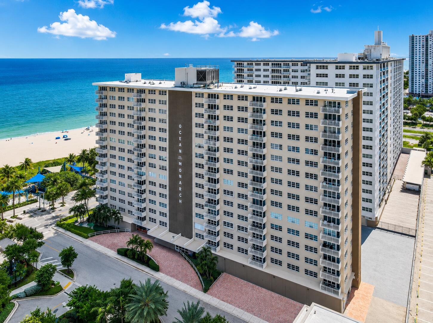 An aerial view of the Ocean Monarch high-rise condominium building situated next to the beach — 133 N Pompano Beach Boulevard # 105, Pompano Beach FL 33062, POMPANO BEACH, FL
