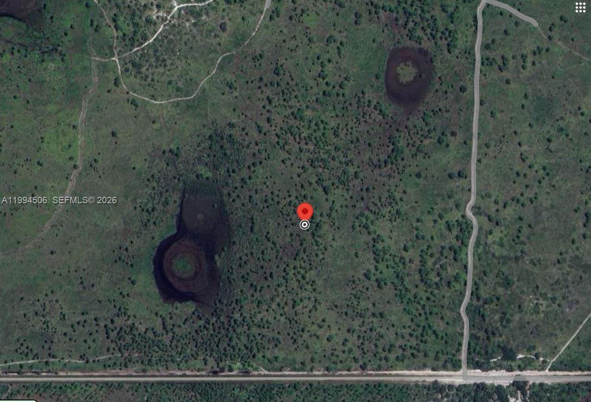 This is a satellite map view of a rural, undeveloped plot of land with vegetation — 0 Frostproof, Frostproof FL 33843, FROSTPROOF, FL