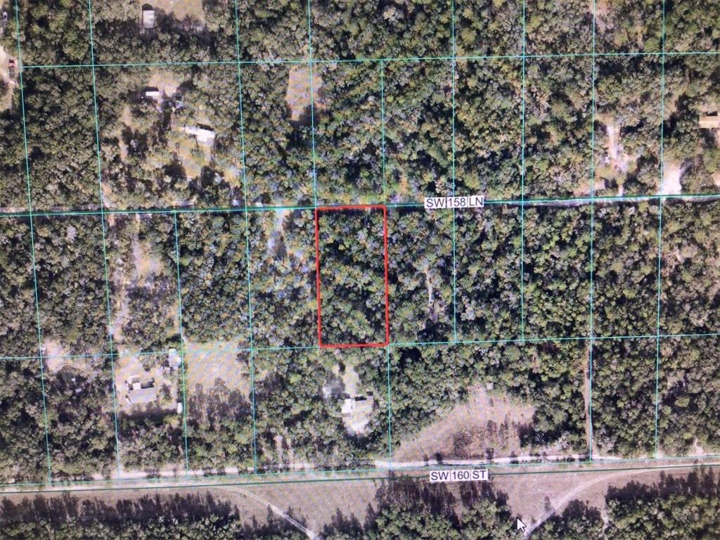 An aerial map view shows a rectangular plot of land outlined in red — 0 SW 158 LANE, DUNNELLON, FL