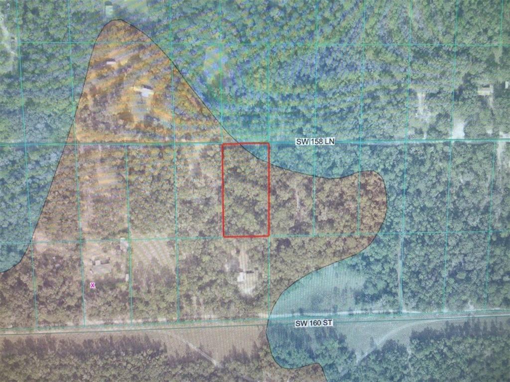 An aerial map shows a rectangular plot of land outlined in red near two roads — 0 SW 158 LANE, DUNNELLON, FL