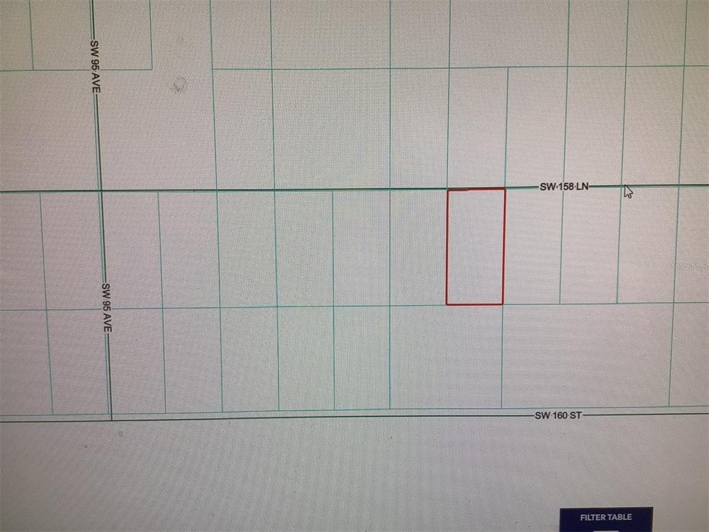 This is a map showing a rectangular property lot highlighted in red — 0 SW 158 LANE, DUNNELLON, FL