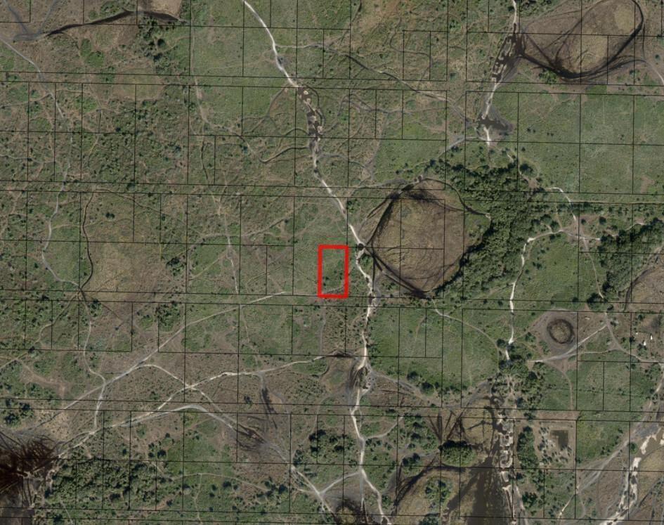 An aerial map view shows a rectangular plot of land highlighted in red — 0 NW 310th Street, Okeechobee FL 34972, OKEECHOBEE, FL
