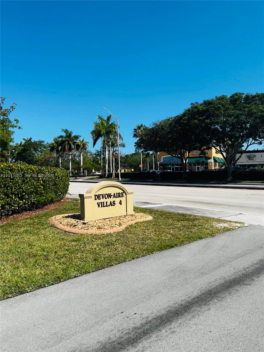 A sign for Devon-Aire Villas 4 stands on a grassy lawn near a road — 12316 SW 119th Ln, Miami FL 33186, MIAMI, FL