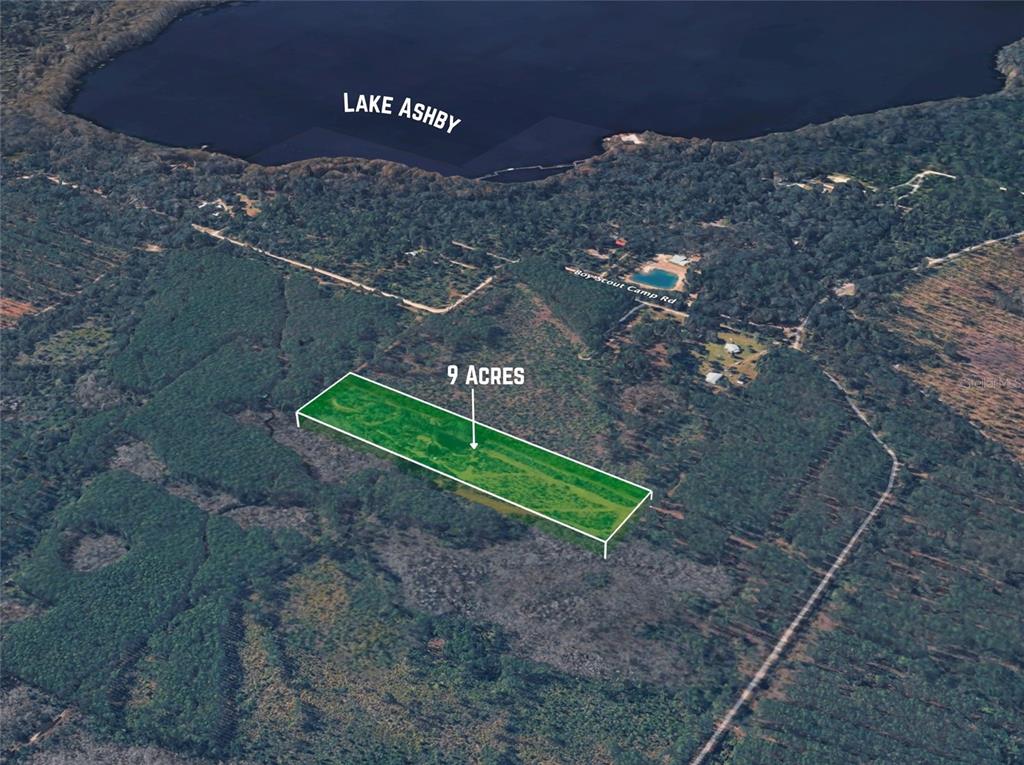 An aerial view shows a rectangular nine-acre plot of land near Lake Ashby — BOY SCOUT CAMP ROAD, NEW SMYRNA BEACH, FL