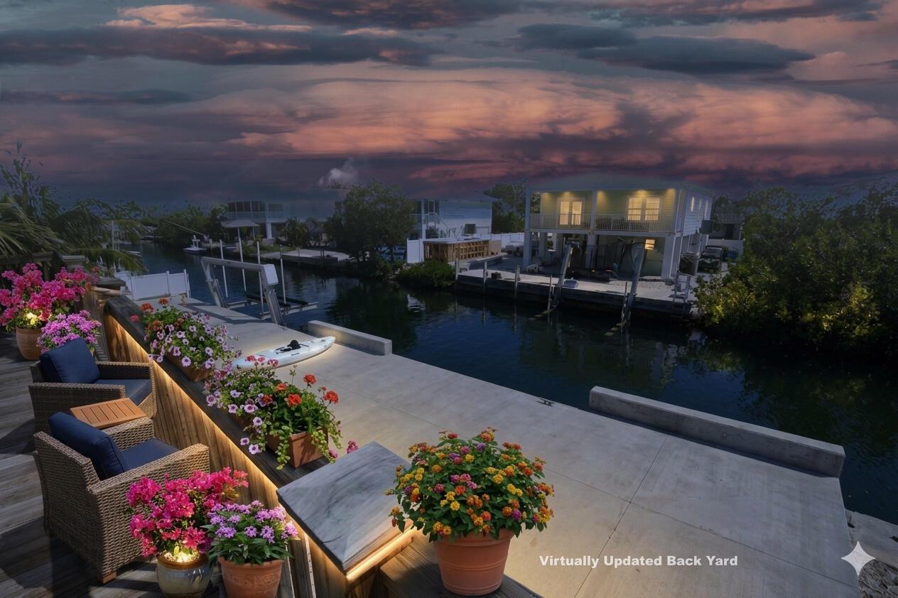 This is a rendering of a waterfront patio featuring potted flowers, seating, and a dock — 22920 Privateer Drive, FL 33042, FL