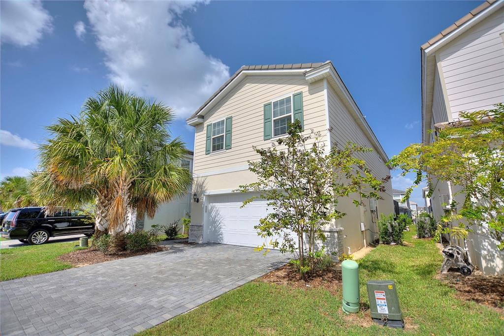 7384 OAKMOSS LOOP, DAVENPORT, FL — photo 2 of 30
