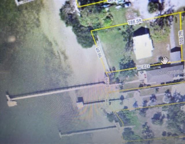 This is an aerial map showing a waterfront property lot with dimensions and a dock — 175 W BAY STREET, ENGLEWOOD, FL