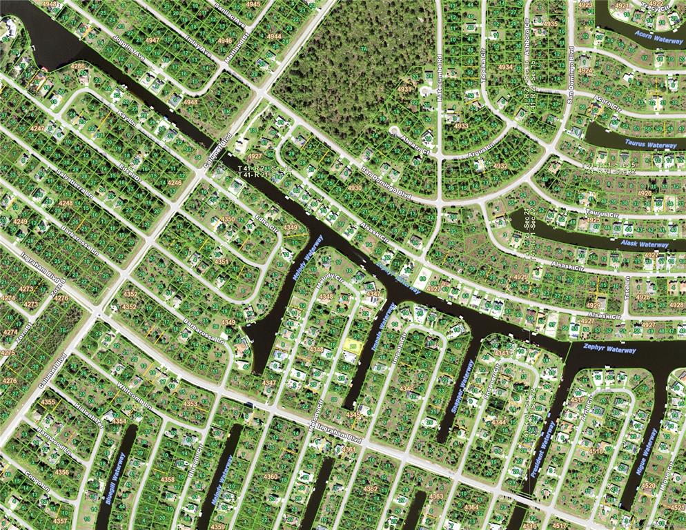This is a map showing a residential neighborhood with numerous canals and streets — 9270 MELODY CIRCLE, PORT CHARLOTTE, FL