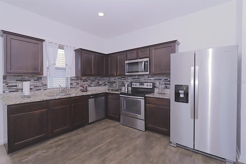 16402 BLOOMING CHERRY DRIVE, GROVELAND, FL — photo 5 of 29