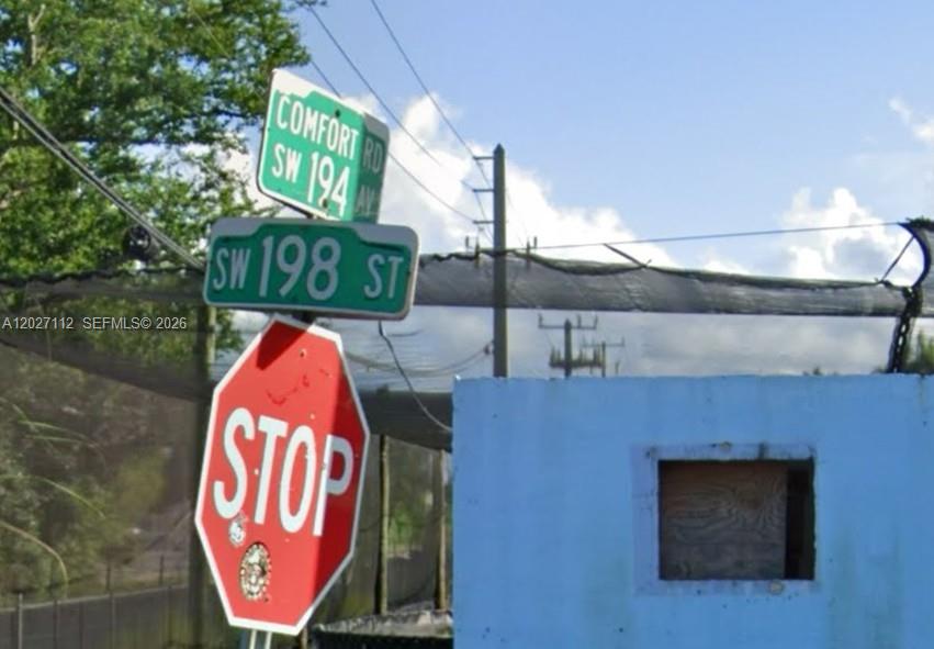 A stop sign and street signs for Comfort Road, SW 194 Avenue, and SW 198 Street — 19490 SW 198TH ST, Miami FL 33187, MIAMI, FL